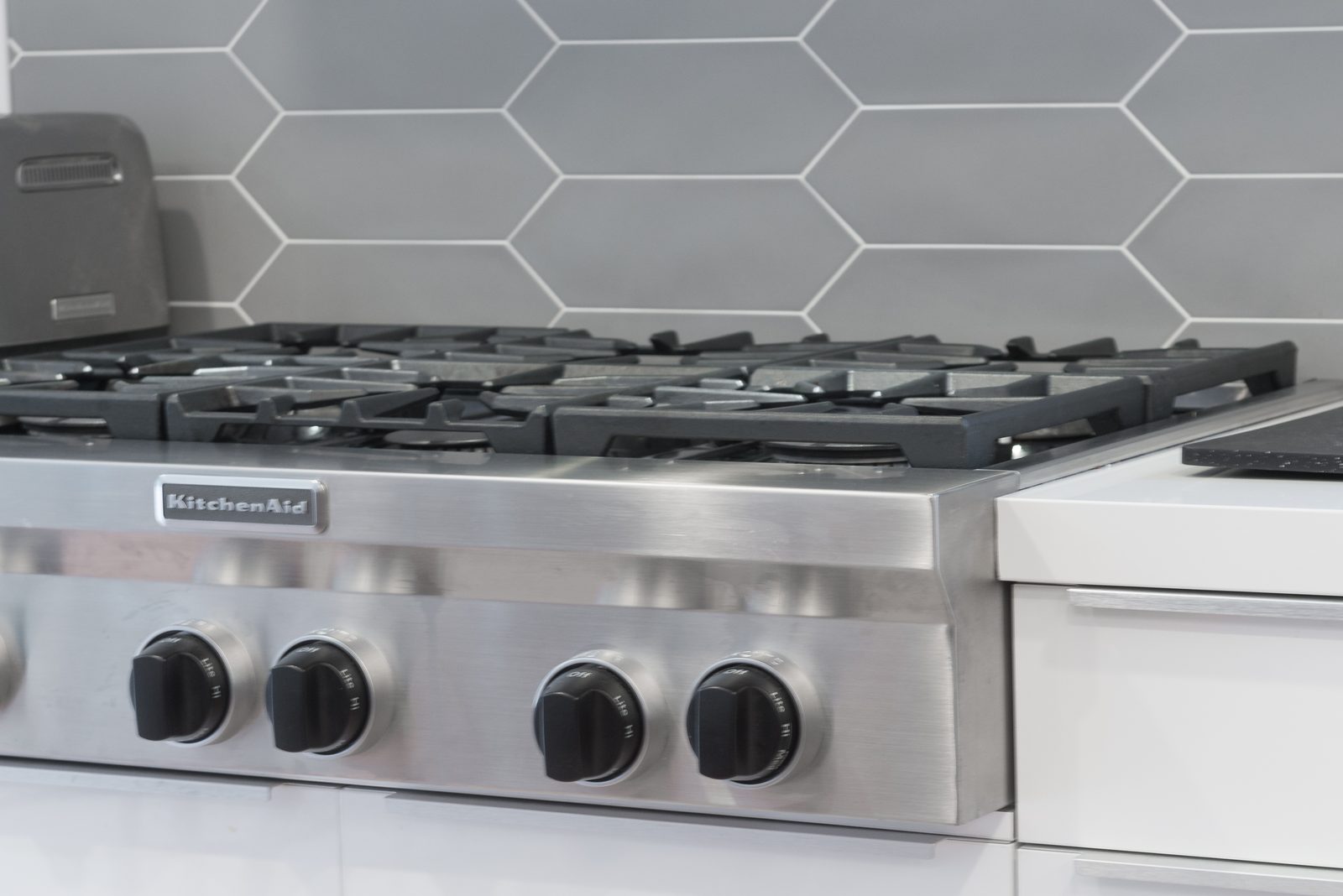 Picket tile behind the pro cooktop