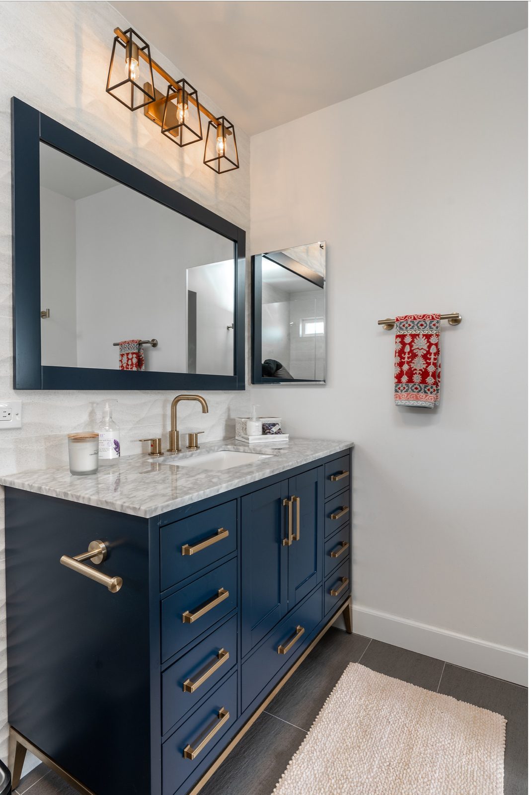 Marble-topped vanity, brass fixtures