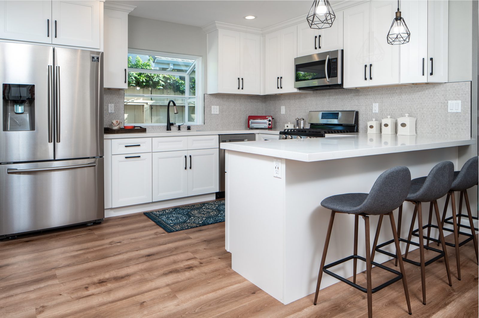 The new island, pendants, and backsplash
