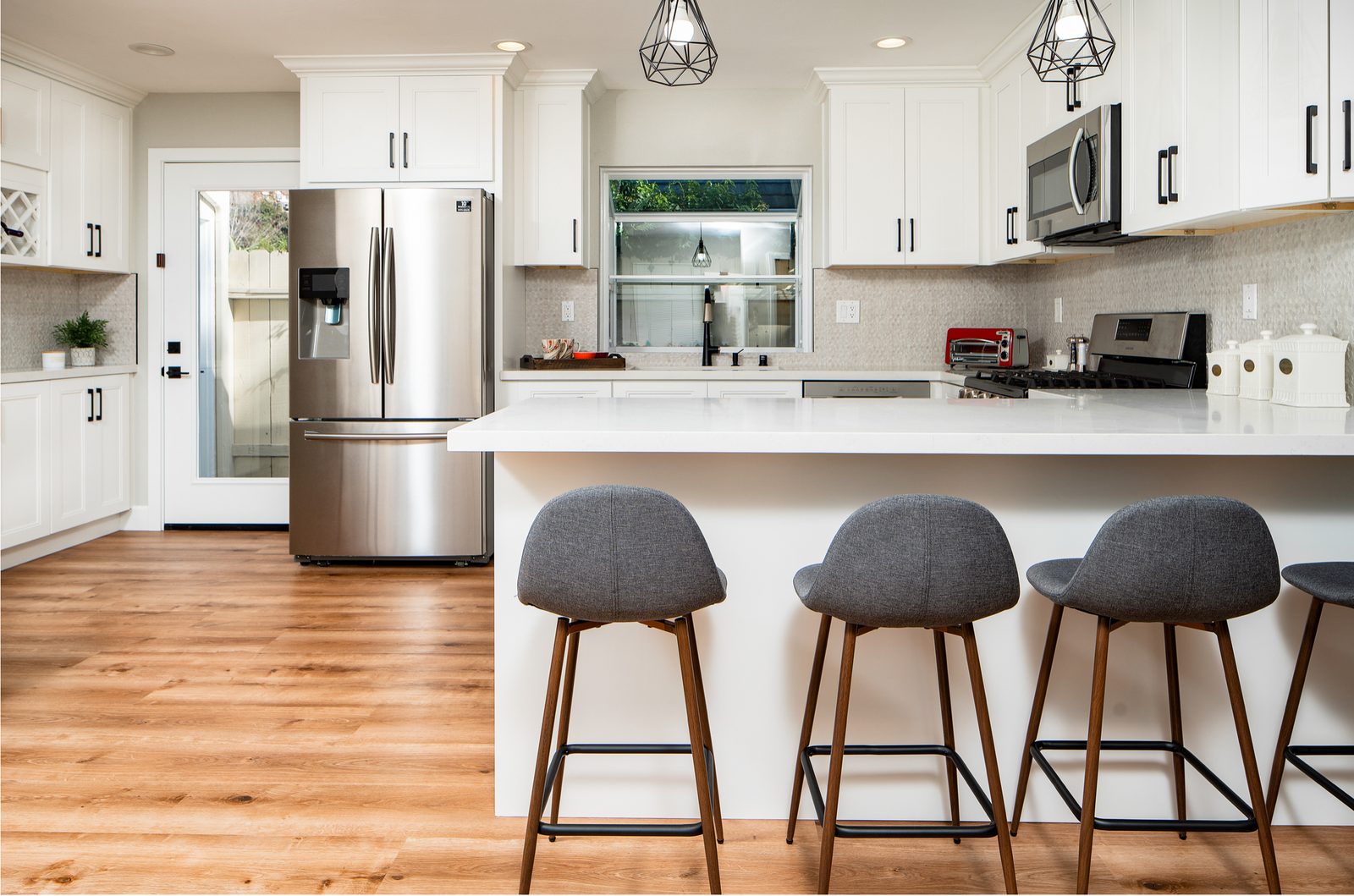 Breakfast-bar view of the finished kitchen