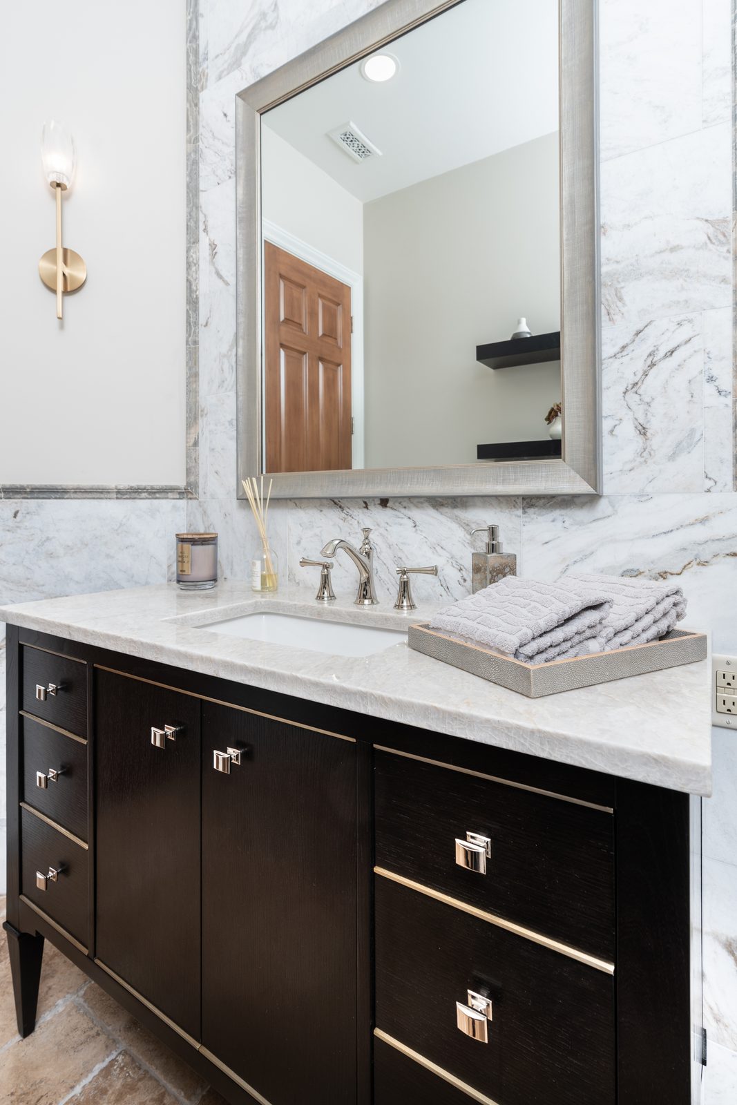 Double vanity in marble surround